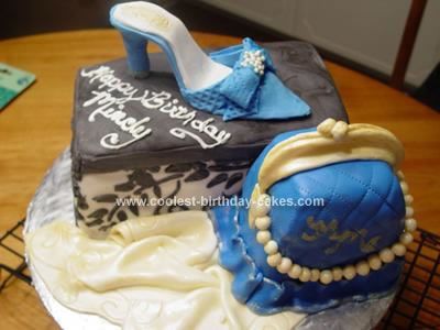 http://i1099.photobucket.com/albums/g389/AceofSky/coolest-shoe-and-purse-birthday-cake-51-21338858.jpg
